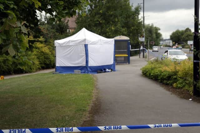 A forensic tent on Fitzwilliam Road in Rotherham following the murder of Mushin Ahmed last summer. Pictures: Ross Parry Agency
