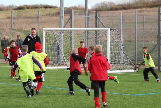 Darren Ferguson leads a coaching session during Rovers half term camps