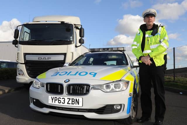 PC Pete Burke is part of the South Yorkshire Police Operation Ophelia which is aiming to catch drivers offending behind the wheel by using a HGV. Picture: Andrew Roe