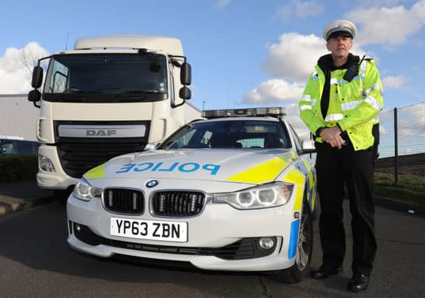 PC Pete Burke is part of the South Yorkshire Police Operation Ophelia which is aiming to catch drivers offending behind the wheel by using a HGV. Picture: Andrew Roe