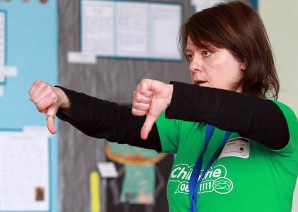 The NSPCC ChildLine Schools Service visited Woodseats Primary School. The School Service educates children about abuse, including bullying, neglect, physical, sexual and emotional abuse. Pictured is Kathy Cookson from the service talking to the students.