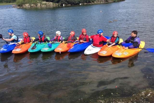 Club Double 6 in Woodseats members trying their hand at kayaking