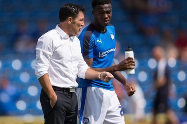 Gboly Aryibi with ex Chesterfield manager Dean Saunders before the Barnsley Game