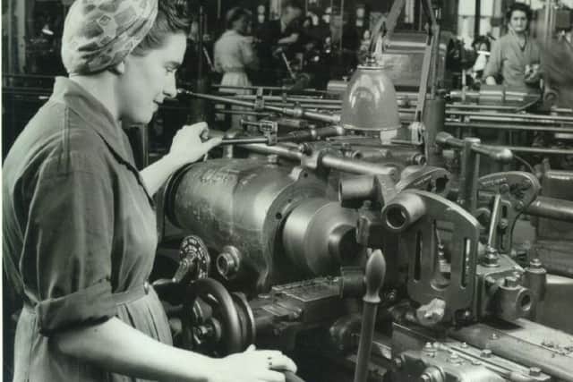 A woman worker at Steelos, the nickname of Rotherham steelworks Steel Peech and Tozer