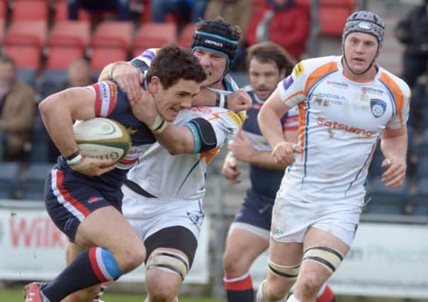 Knights'  Paul Jarvis  of Doncaster Knights tries to break the Yorkshire Carnegie  defence. He later had to go off injured and the club will be checking on him today.