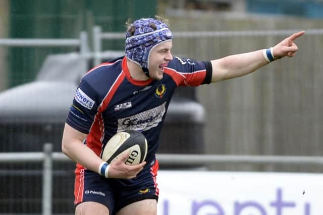 Ed Miles celebrates his try