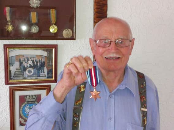 Fred Peeters with his Arctic Star medal.