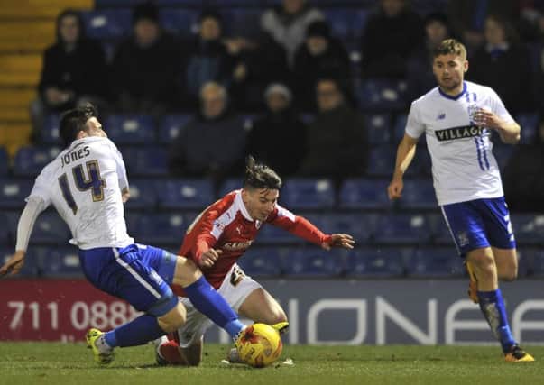 Adam Hamill, pictured, was sent off late in the second half but Barnsley earned a point at Gigg Lane.