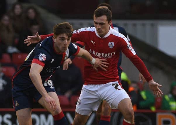 Rovers are hoping to extend the loan of  Lynden Gooch, pictured fending off Barnsley's Josh Scowen. Photo: 

Andrew Roe