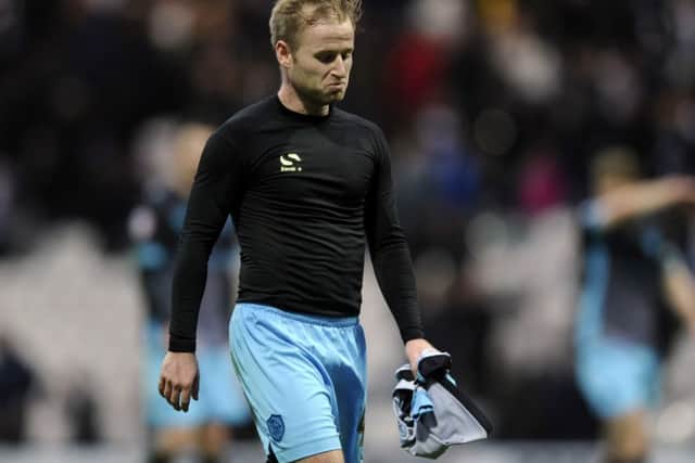 Dejection at the end for Barry Bannan