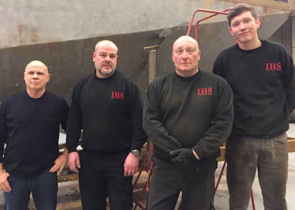 From left, directors Chris Smith and Nick Doe, hydraulics fitter Michael Rogers and Harry Doe, apprentice.