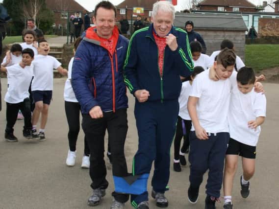 Three Legs Good  Two Legs Bad: BBC Look Norths Paul Hudson (left) and Harry Gration (right) warm up for their epic three-legged challenge