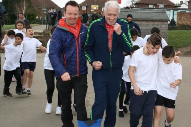Three Legs Good  Two Legs Bad: BBC Look Norths Paul Hudson (left) and Harry Gration (right) warm up for their epic three-legged challenge