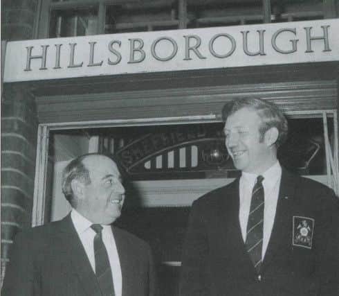 Derek Dooley
With Eric Taylor on the day he was appointed team manager