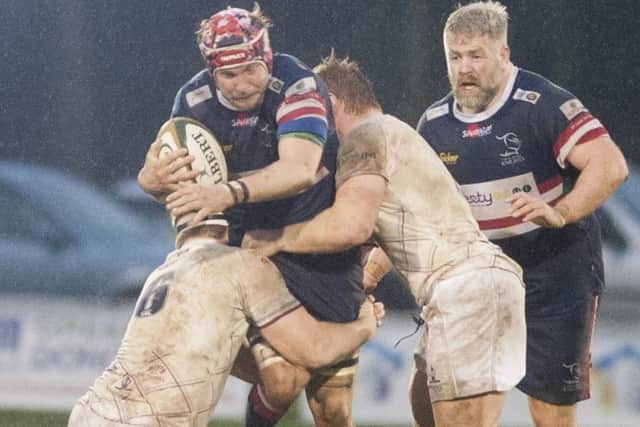 Michael Hills (centre) and Colin Quigley (right) this week signed new deals with Doncaster Knights