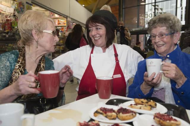 Moor Market Tea Party in Sheffield hosted by Sharon's Cafe
Sharon sharea joke with Maggie Hardy and Aileen McAssey
Picture Dean Atkins