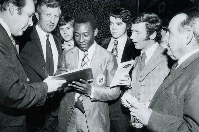Derek Dooley
The day Pele returned to Hillsborough. Signing autographs for Tony Pritchett, Jimmy Mullen, Allan Thompson, Tommy Craig and Eric Taylor.
