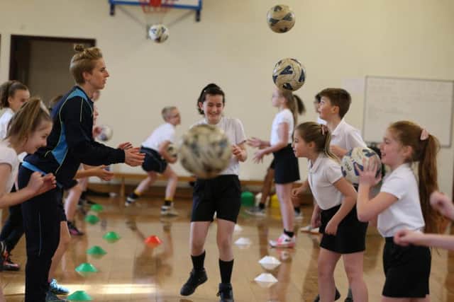 Belles striker Natasha Dowie was at Plover Primary School on Monday for the fifth round draw of the SSE Womens FA Cup.