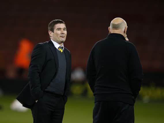 Nigel Clough dons a suit on his return to Bramall Lane