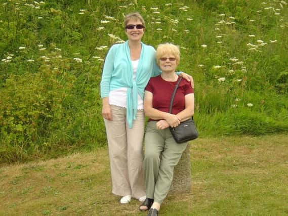 Julie Hill and her mother Rose Hill who were found dead at a house in Shirebrook, Derbyshire, on Friday, February 26. One man faces trial for murder.