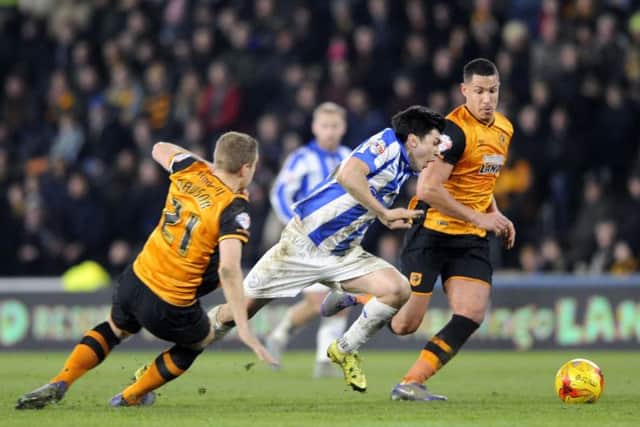 Fernando Forestieri goes down under a challenge from Michael Dawson, which saw him booked and then sent off
