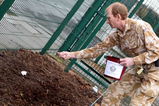 Steven Abel, Facilities Manager, pictured scattering Poppy seeds at Ashworth Barracks. Twenty Million Poppy seeds are to be planted along with 2000 plants, shrubs and trees to help create the Memorial Garden. Picture: Marie Caley NDFP Ashworth Poppies MC 2
