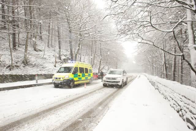 Accident in the snow on Rivelin Valley Road, Sheffield