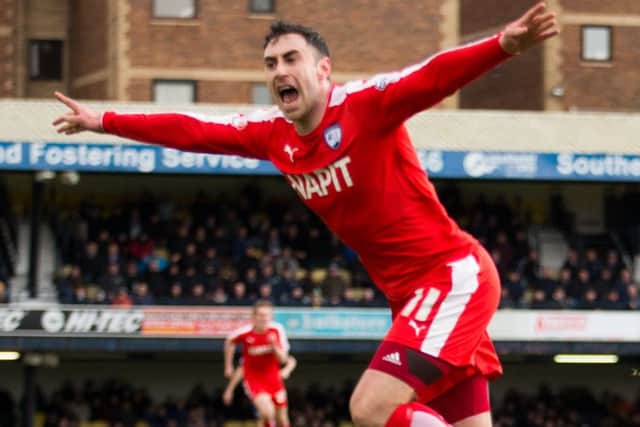 Lee Novak celebrates his winning goal. Photo:  James Williamson