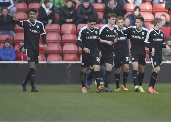 Barnsley's Ashley Fletcher celebrates his opening goal in the 3-1 win at Walsall. Photo: Keith Turner