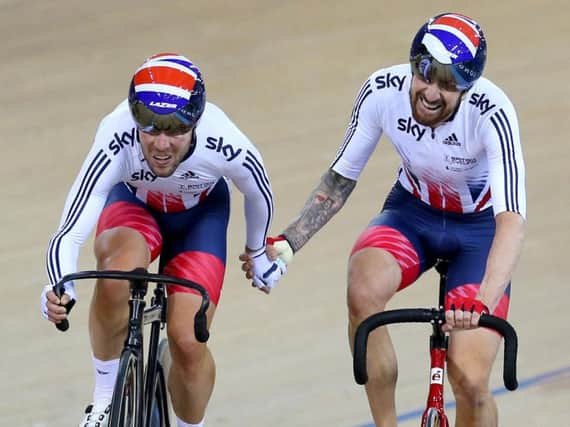 Mark Cavendish and Sir Bradley Wiggins after their gold medal triumph