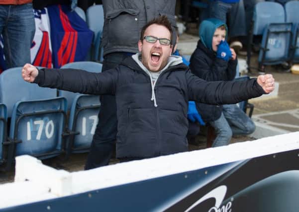 Southend United vs Chesterfield - A delighted chesterfield fan celebrates Lee Novaks winning goal - Pic By James Williamson