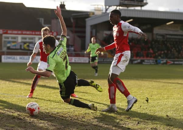 Ryan Flynn of Sheffield Utd brought down in the penalty area by Amari Bell of Fleetwood Town to earn a penalty