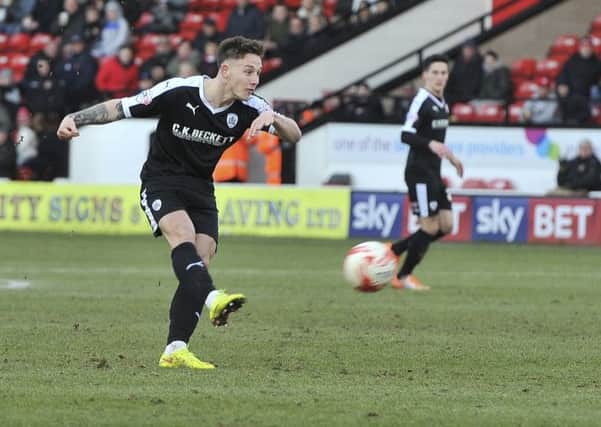 Barnsley's second goalscorer Josh Brownhill fires home from 25 yards against Walsall