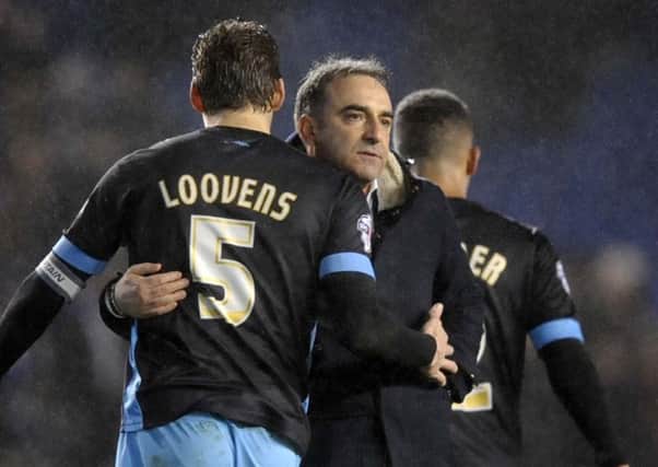 Carlos Carvalhal with Glenn Loovens at the final whistle. Photo: Steve Ellis