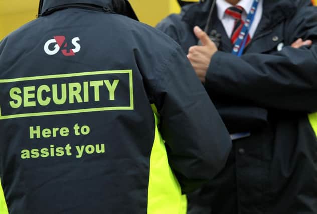 G4S Security guards outside the USA training base at Alexandra Stadium, Birmingham Photo:  David Davies/PA Wire.