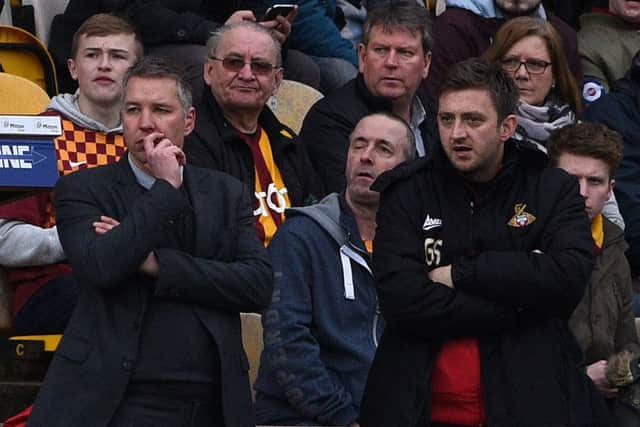 Darren Ferguson and Gavin Strachan watch on at Bradford.