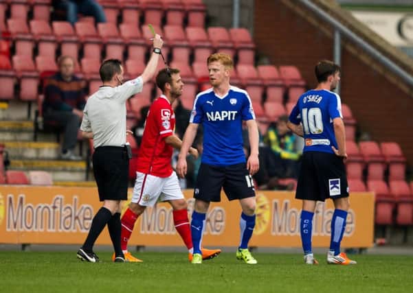 Crewe Alexandra vs Chesterfield - Liam O'Neil receives a booking - Pic By James Williamson