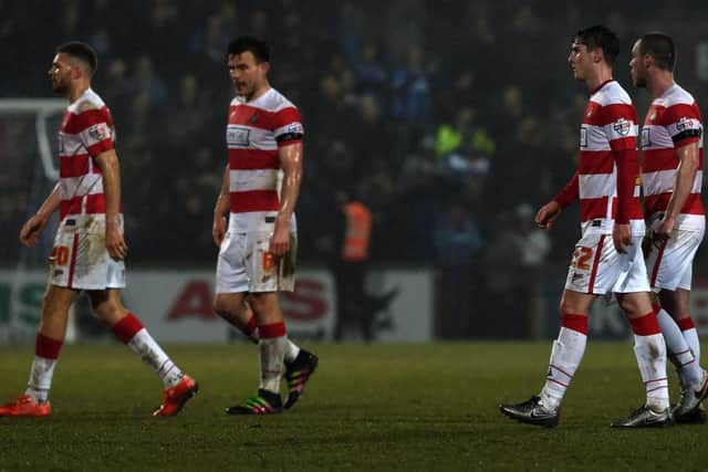Rovers' players trudge off after defeat to Scunthorpe.