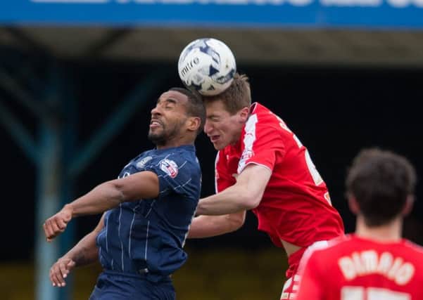 Southend United vs Chesterfield - Tom Anderson heads the ball - Pic By James Williamson