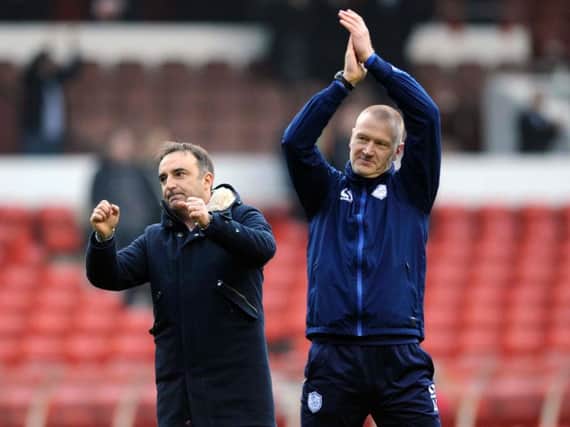 Carlos Carvalhal and Lee Bullen celebrate at the final whistle