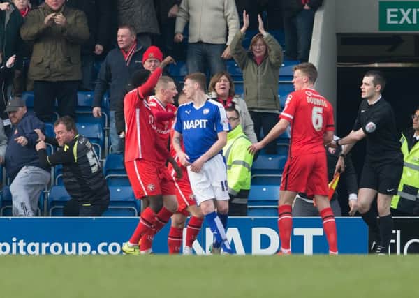 Chesterfield vs Walsall - Dion Donohue gets into an arguement in the aftermath of Sam Mantons goal for Walsall - Pic By James Williamson
