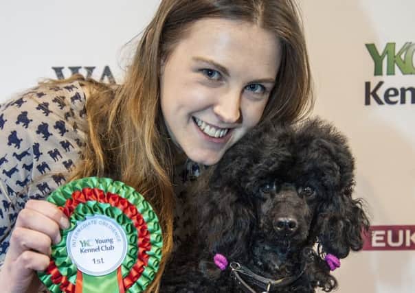 Picture shows YKC Ring - Obedience Winner (Intermediate)  Ella Armstrong and her Miniature Poodle Daphne, the second day of Crufts 2016, at the NEC Birmingham. 
Copyright onEdition 2016 Â©