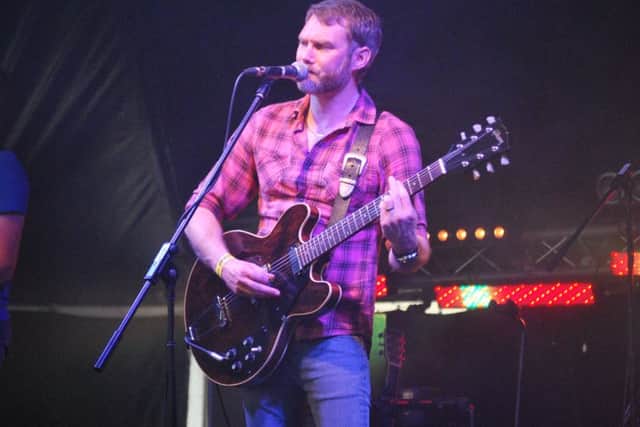 Christian Dawson is Caleb Followill in Kings of Leon tribute band Kings of Lyon.