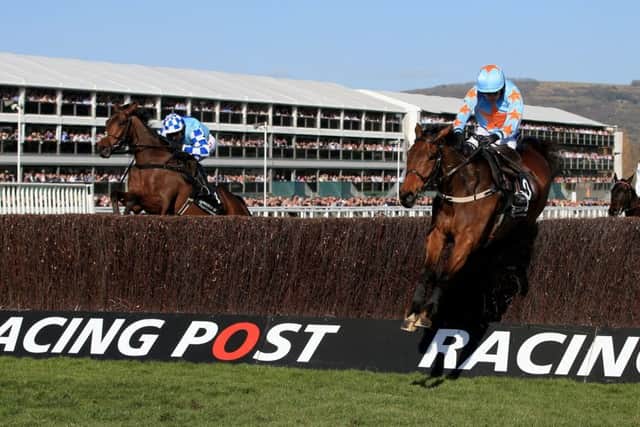Un De Sceaux ridden by Ruby Walsh (right) jumps the last fence on the way to winning the Racing Post Arkle Challenge Trophy Chase at Cheltenham last year. The pair are tipped to follow up in the Betway Queen Mother Champion Chase on Wednesday. Picture: Nick Potts/PA Wire.
