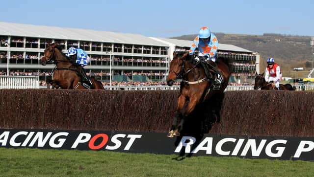 Un De Sceaux ridden by Ruby Walsh (right) jumps the last fence on the way to winning the Racing Post Arkle Challenge Trophy Chase  at Cheltenham last year. The pair are tipped to follow up in the  Betway Queen Mother Champion Chase on Wednesday. Picture: Nick Potts/PA Wire.