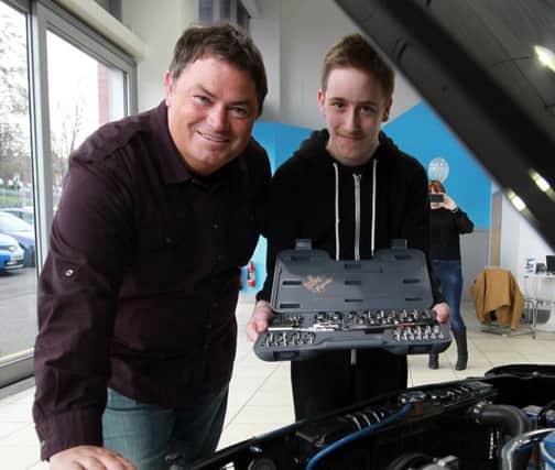 Jarrad Smith was presented with a special gift by TV star Mike Brewer at Mike Brewer Motors in Sheffield.
