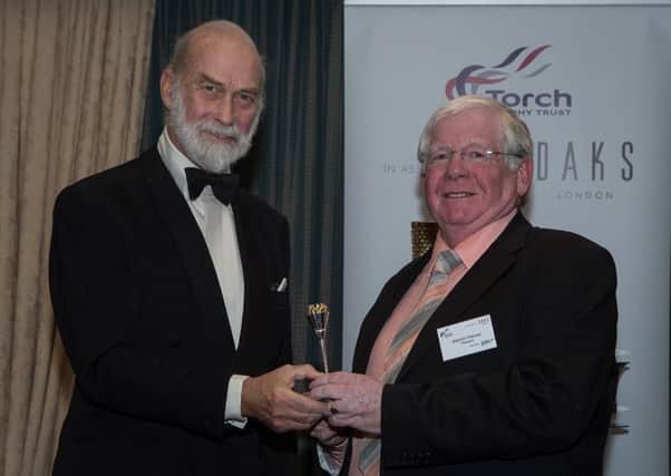 Malcolm Fletcher receiving his award presented by HRH Prince Michael of Kent at Torch Trophy Trust Awards 2016 honouring volunteers in sport