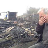 John Holmes, 73, at his allotment in Barnsley where his pigeons and chickens were killed in a fire.