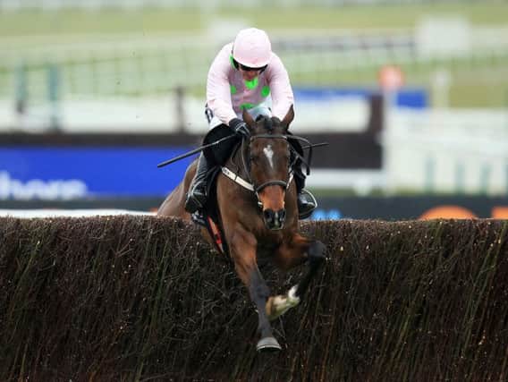 Douvan ridden by Ruby Walsh jumps the last fence on the way to winning the Racing Post Arkle Challenge Trophy Chase during Champion Day of the 2016 Cheltenham Festival at Cheltenham Racecourse. PRESS ASSOCIATION Photo