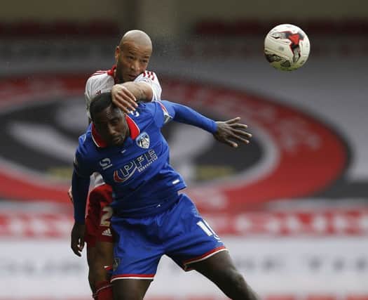 Alex Baptiste of Sheffield Utd challenges Jonathan Forte of Oldham Athletic 
Â©2016 Sport Image all rights reserved